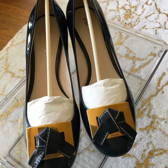 Prada Black and Gold Heels with Elegant Design